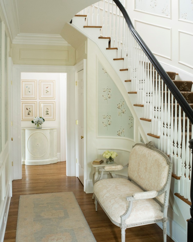 Foyer - traditional foyer idea in Charlotte with blue walls