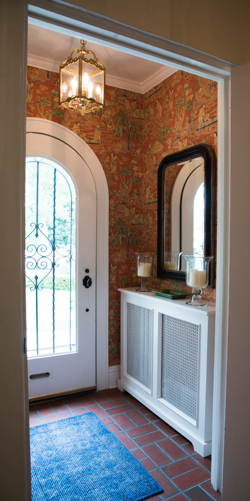 Entryway - small asian terra-cotta tile entryway idea in Milwaukee with multicolored walls and a glass front door