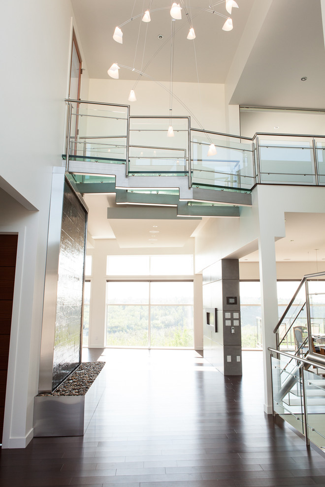 Entryway - modern entryway idea in Edmonton with white walls