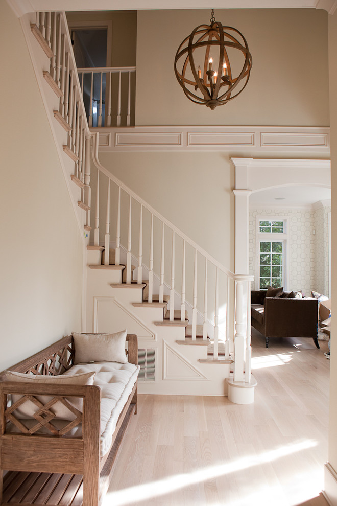 This is an example of a classic entrance in Portland with beige floors.