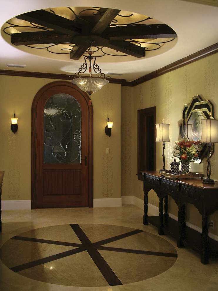 Example of a tuscan entryway design in Tampa
