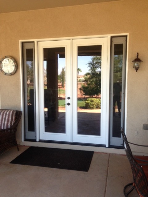 Inspiration for a medium sized traditional front door in Phoenix with beige walls, concrete flooring, a double front door and a glass front door.