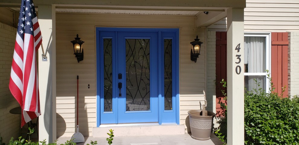 Ispirazione per una porta d'ingresso boho chic con una porta singola e una porta blu