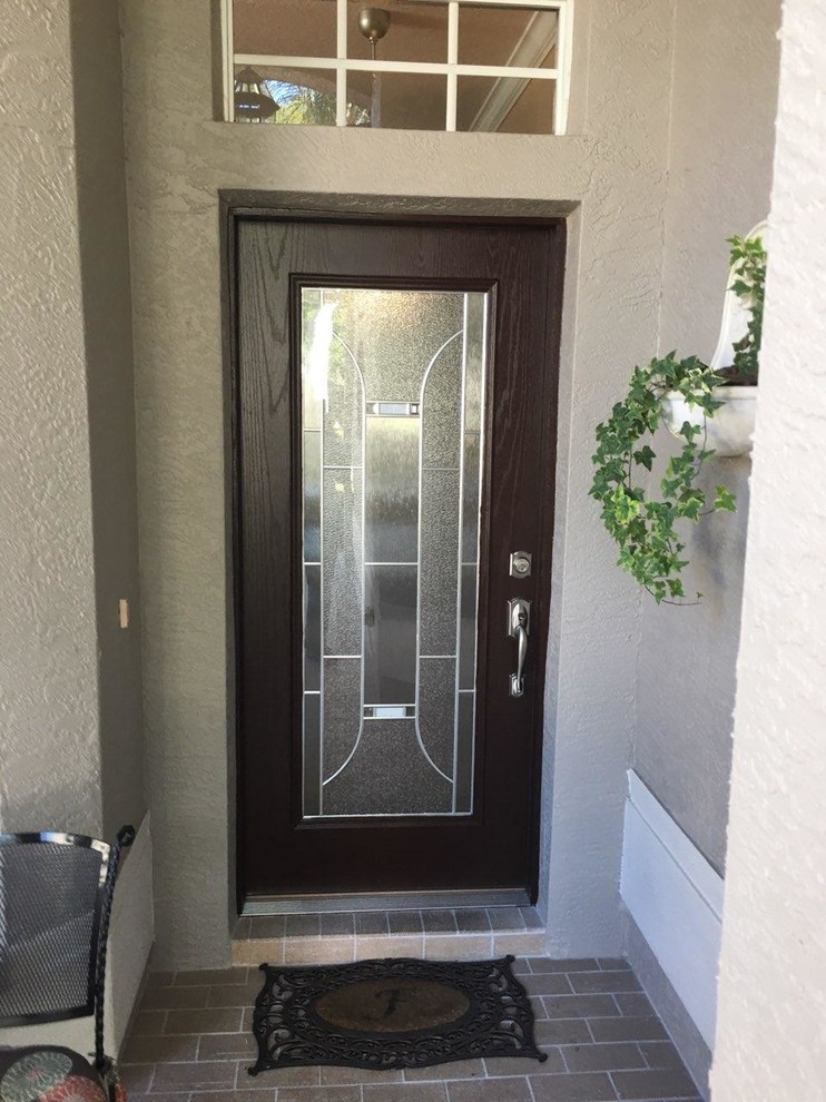 Photo of a contemporary front door in Tampa with a single front door.