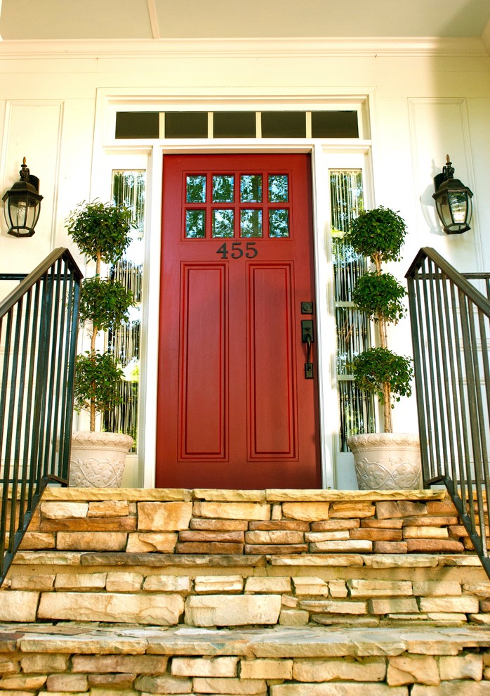 Inspiration for a timeless entryway remodel in Atlanta with a red front door