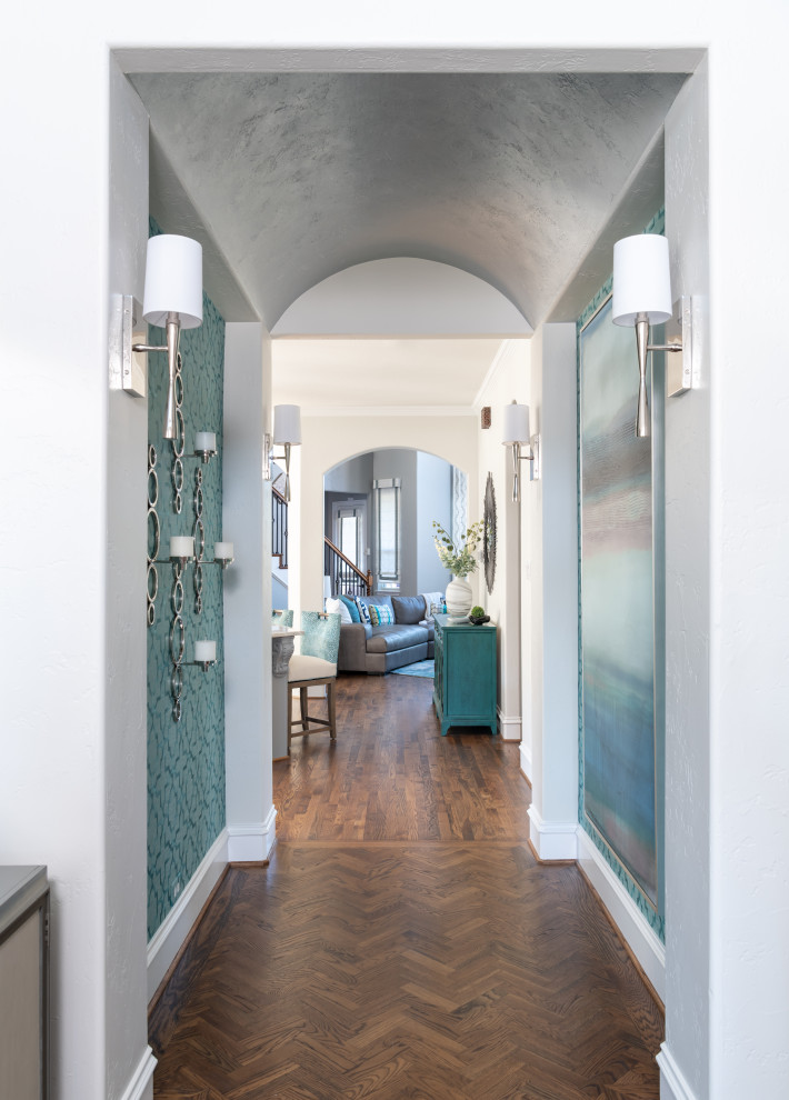 This is an example of a medium sized classic foyer in Dallas with grey walls, medium hardwood flooring, a single front door, a medium wood front door, brown floors and wallpapered walls.