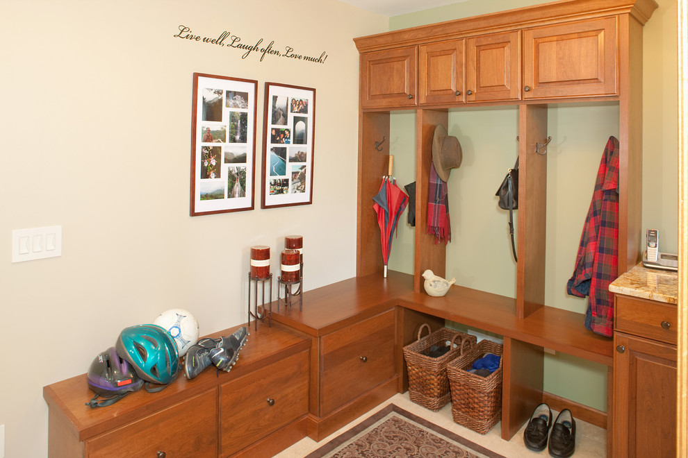 Design ideas for a medium sized classic boot room in Minneapolis with multi-coloured walls and beige floors.