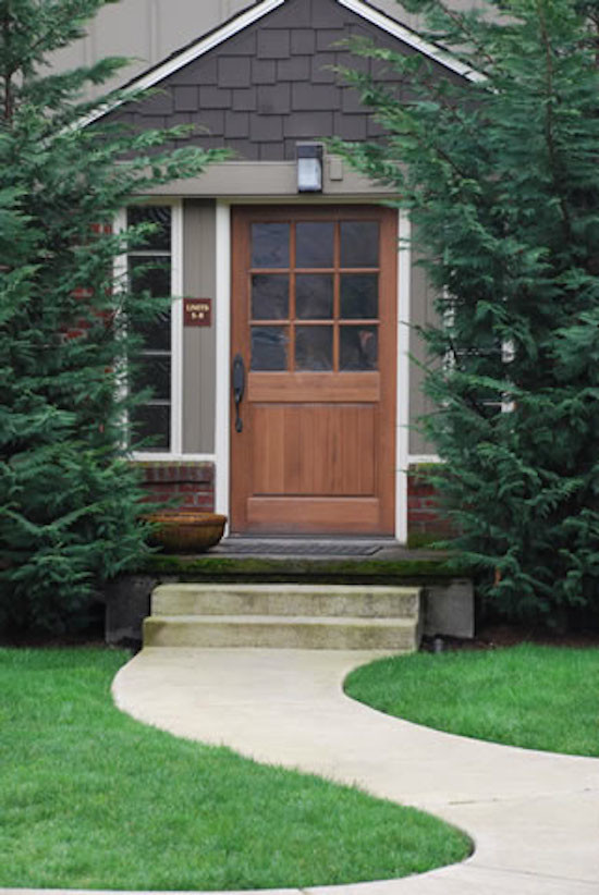 Medium sized classic entrance in Portland with a pivot front door and a medium wood front door.