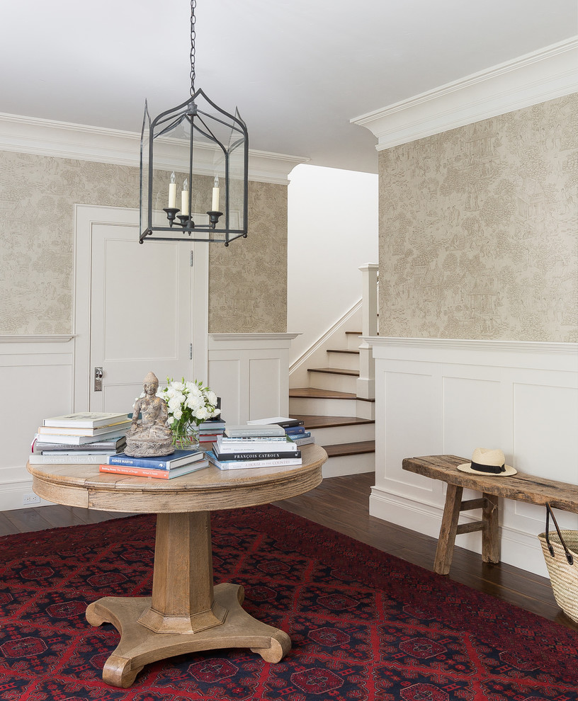 Inspiration for a cottage dark wood floor foyer remodel in San Francisco with beige walls