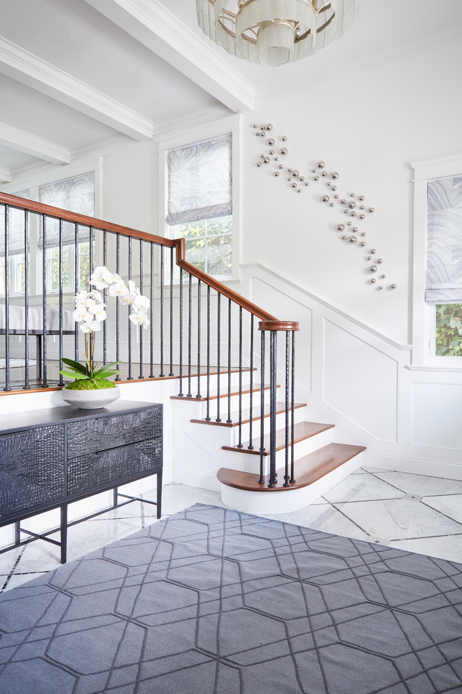 Photo of a traditional foyer in Los Angeles with white walls.