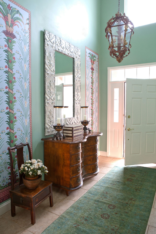 Design ideas for a medium sized eclectic foyer in New York with green walls, ceramic flooring, a single front door and a white front door.