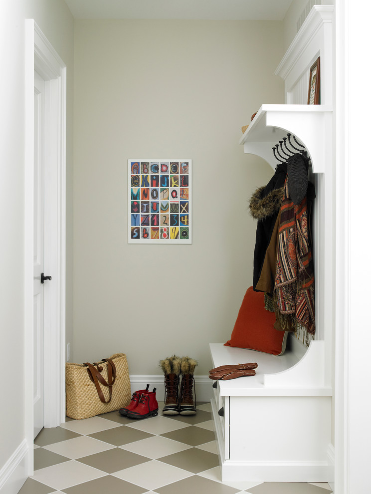 Design ideas for a traditional boot room in Toronto with beige walls.
