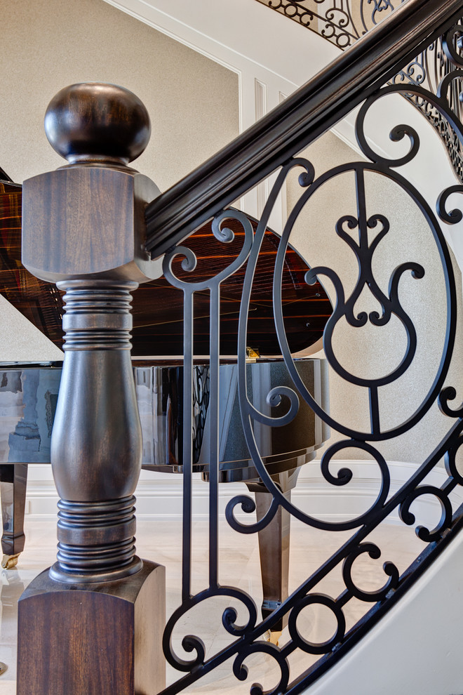 Staircase - huge traditional staircase idea in Miami