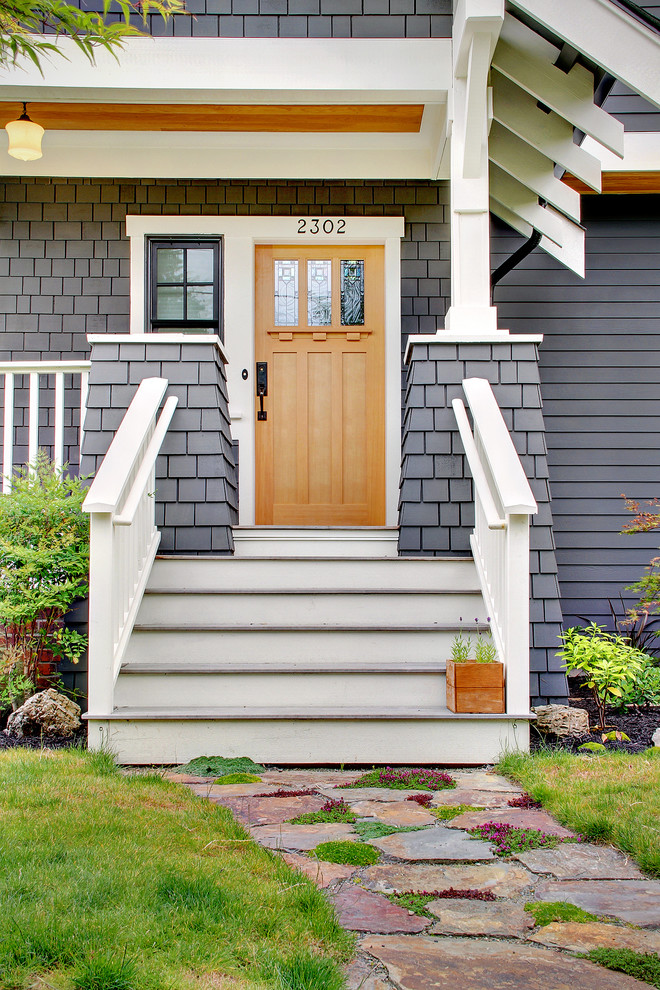 Example of an arts and crafts entryway design in Seattle
