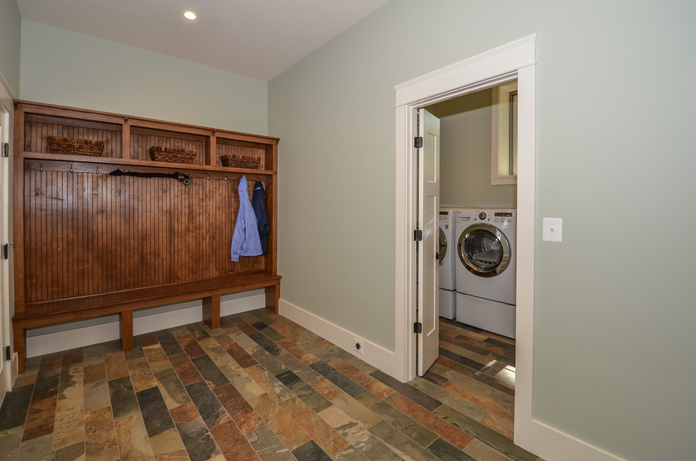 Example of an arts and crafts porcelain tile mudroom design in DC Metro with blue walls