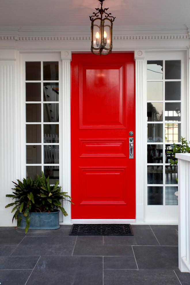 Entryway - mid-sized traditional entryway idea in Brisbane with a red front door