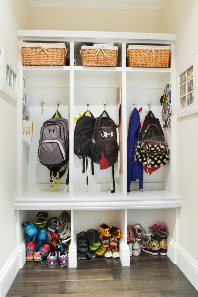 Mudroom - traditional mudroom idea in Miami with white walls
