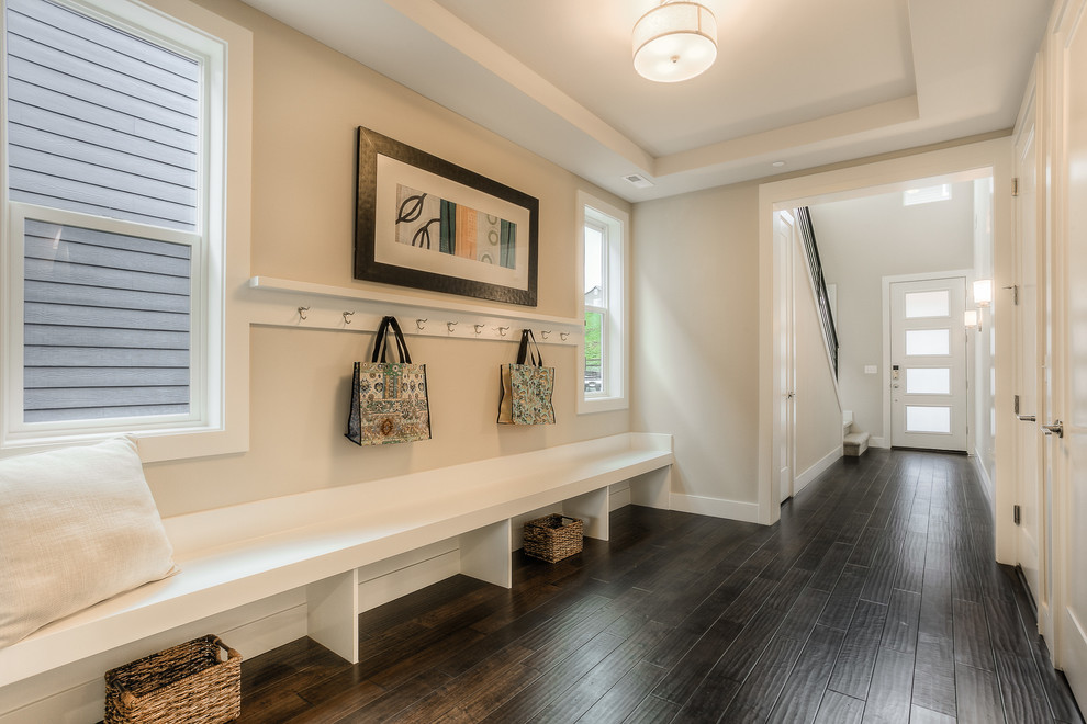 Classic entrance in Seattle with beige walls, dark hardwood flooring, a single front door and a white front door.