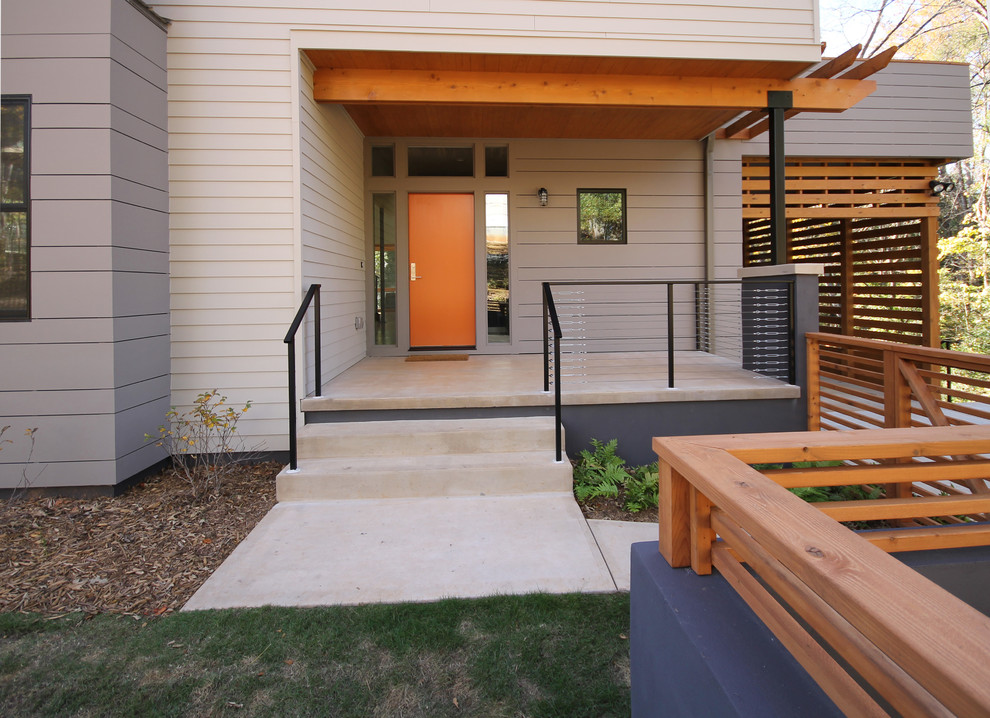 Kleine Moderne Haustür mit Einzeltür und oranger Haustür in Atlanta