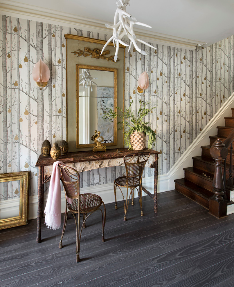 Inspiration for an eclectic dark wood floor foyer remodel in Toronto with multicolored walls