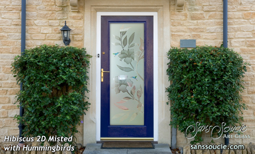 Idee per una porta d'ingresso tradizionale di medie dimensioni con pareti beige, pavimento in travertino, una porta singola e una porta in vetro