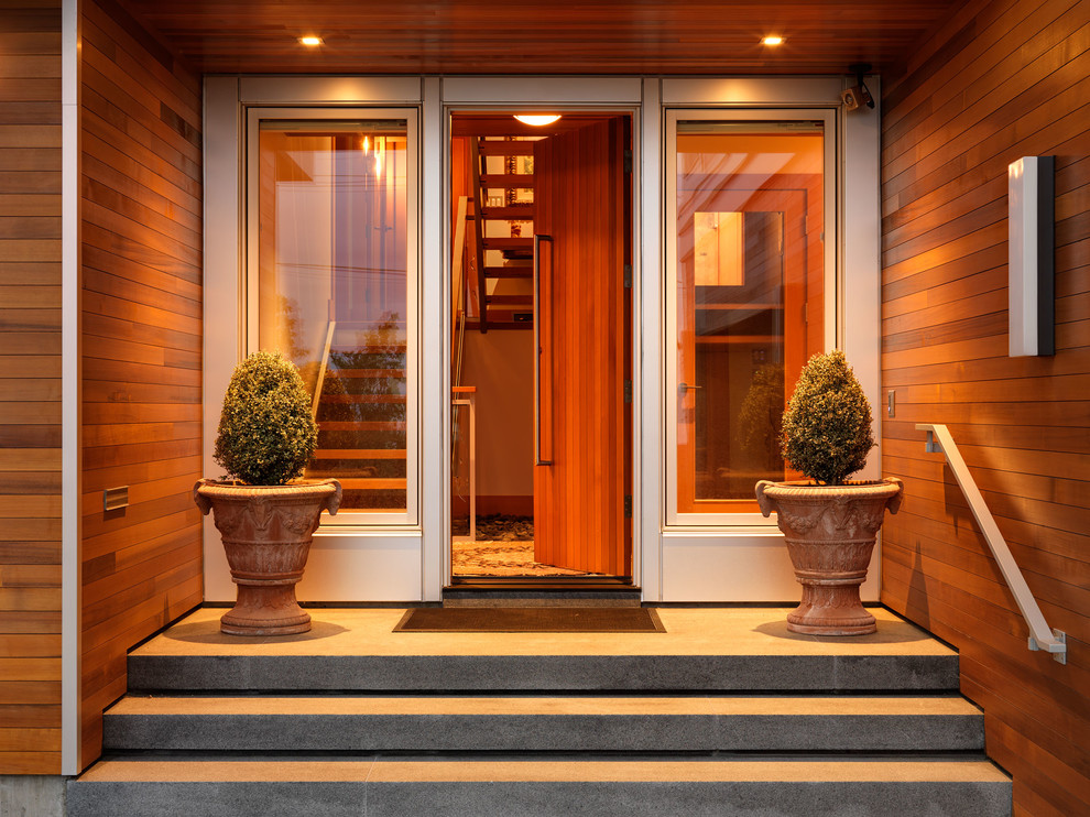 Contemporary entrance in Vancouver with a single front door.