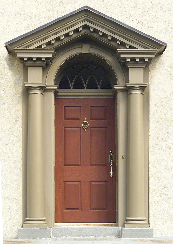Photo of a classic entrance in Philadelphia with beige walls, a light wood front door and a single front door.