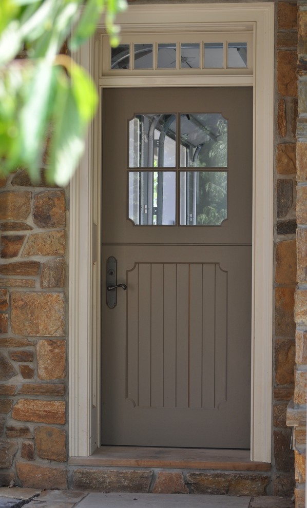 Mountain style entryway photo in Philadelphia with a dark wood front door
