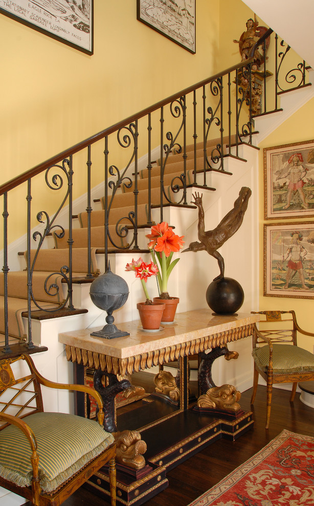 Inspiration for a classic foyer in Los Angeles with yellow walls.
