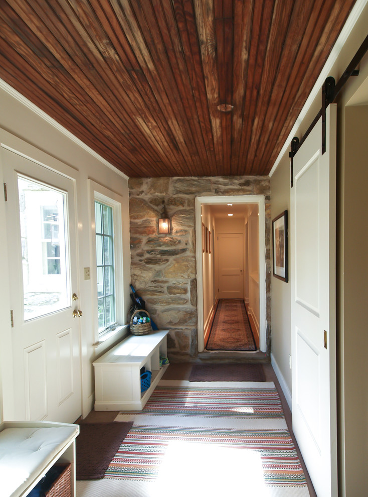 Entryway - mid-sized traditional entryway idea in Other with white walls and a white front door