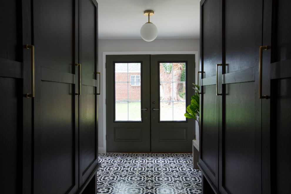 Photo of a medium sized midcentury boot room in DC Metro with porcelain flooring, a double front door and a glass front door.