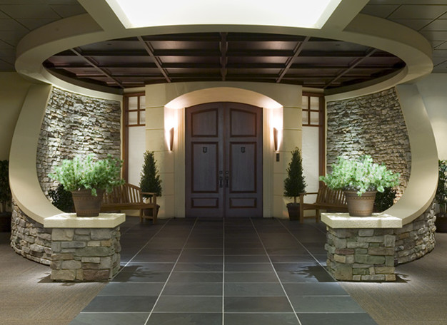Идея дизайна: входная дверь среднего размера в стиле неоклассика (современная классика) с бежевыми стенами, полом из керамической плитки, двустворчатой входной дверью и входной дверью из темного дерева