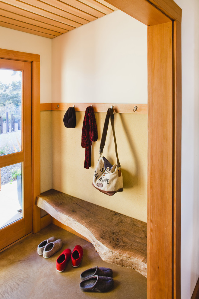 Photo of a rural boot room in San Francisco with beige walls, a single front door and a glass front door.