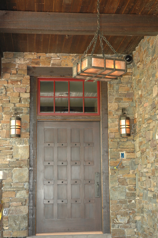 Inspiration for an industrial entryway remodel in Seattle