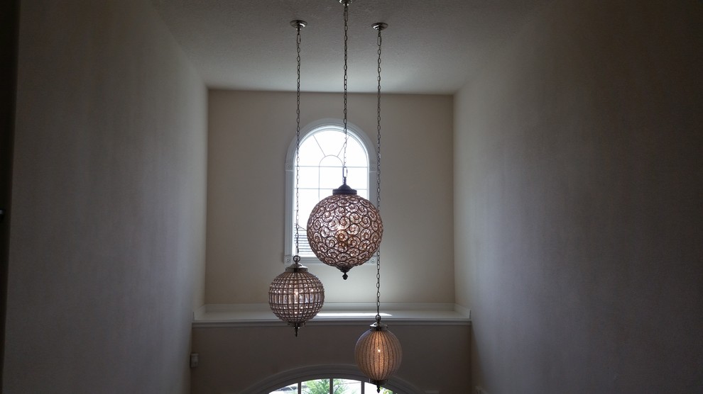 Inspiration for an expansive classic foyer in Portland with white walls.