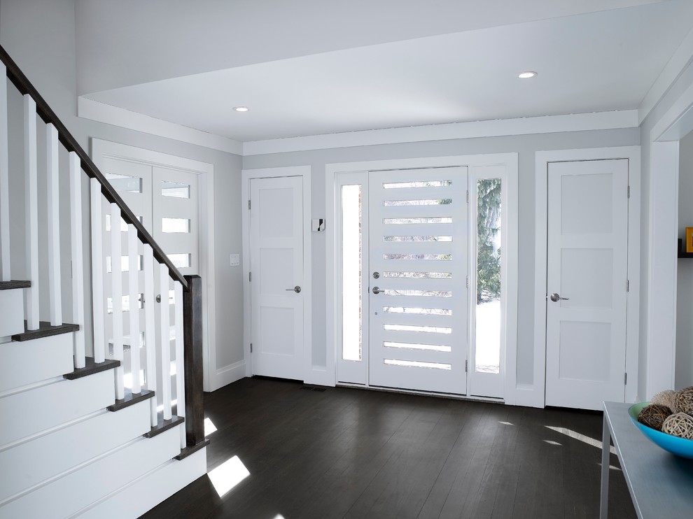 Inspiration for a medium sized classic front door in New York with grey walls, dark hardwood flooring, a single front door and a white front door.