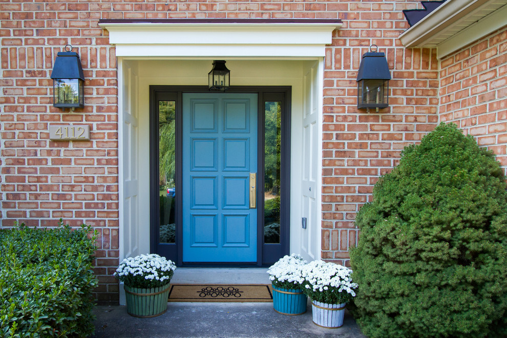 Traditional front door in DC Metro with a single front door and a blue front door.