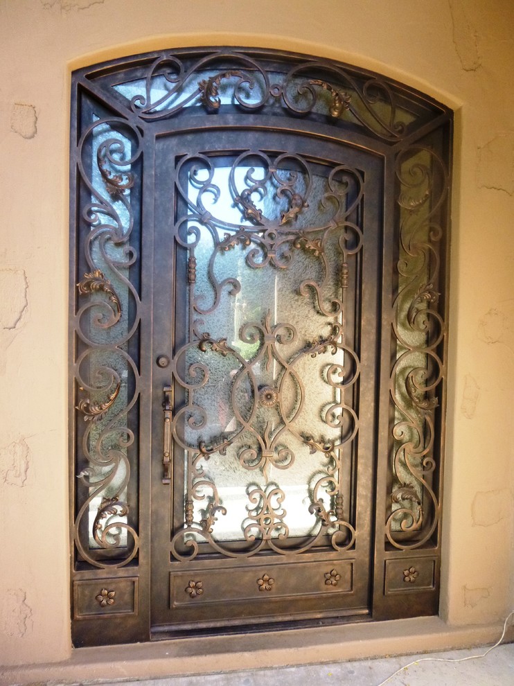 Inspiration for a large classic front door in Phoenix with beige walls, a single front door and a metal front door.