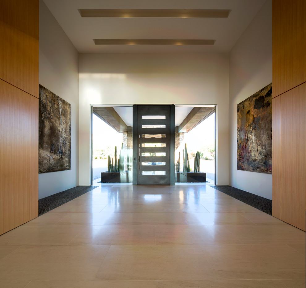 Foto di una porta d'ingresso design di medie dimensioni con pareti bianche, pavimento in gres porcellanato, una porta singola, una porta in legno scuro e pavimento beige