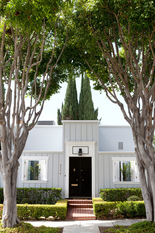 This is an example of a classic entrance in Los Angeles with a double front door.