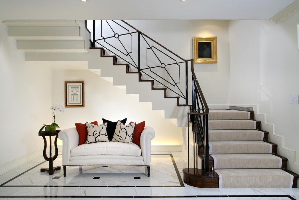 Foyer - large transitional marble floor and multicolored floor foyer idea in DC Metro with white walls