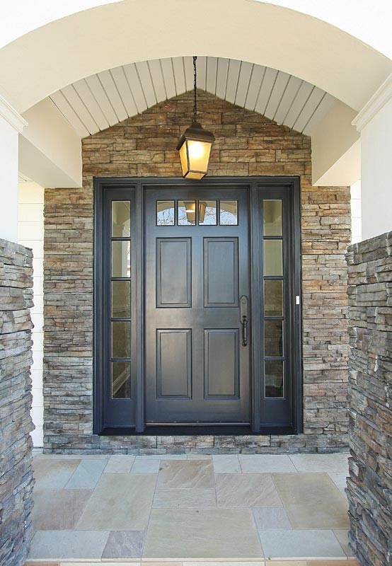 Design ideas for a classic entrance in Los Angeles with feature lighting.