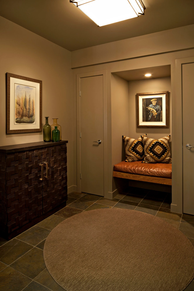 Small classic foyer in Calgary with green walls, slate flooring, a single front door and a medium wood front door.