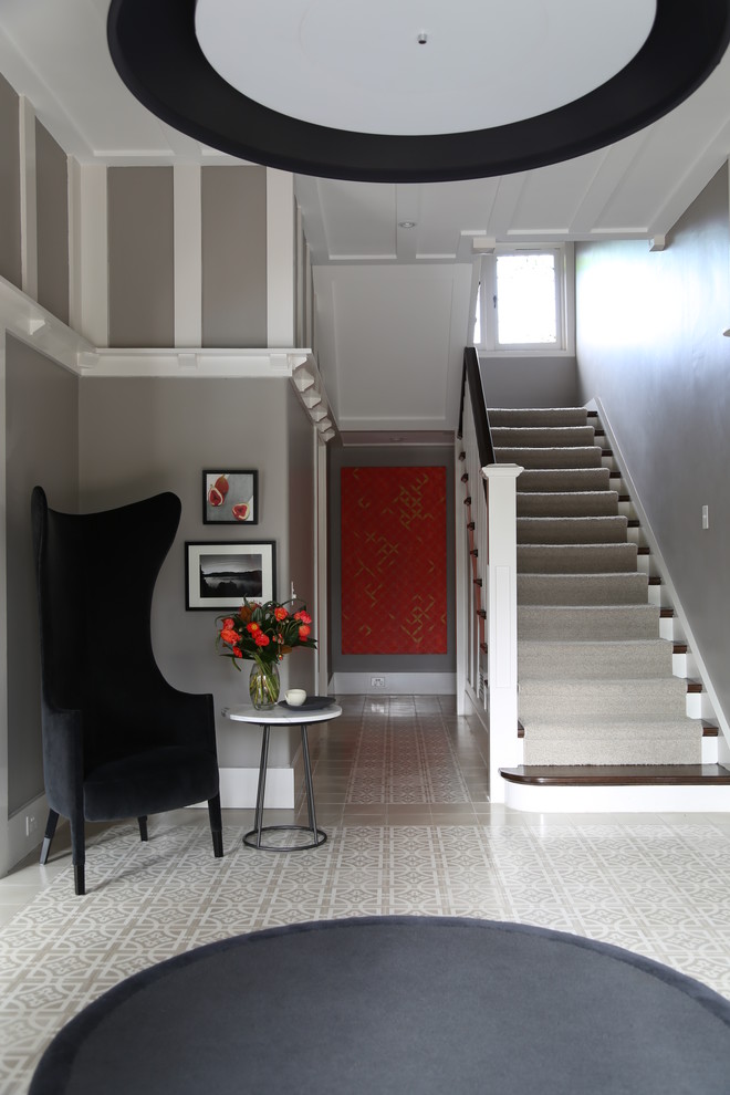 Inspiration for a medium sized contemporary foyer in Sydney with grey walls.