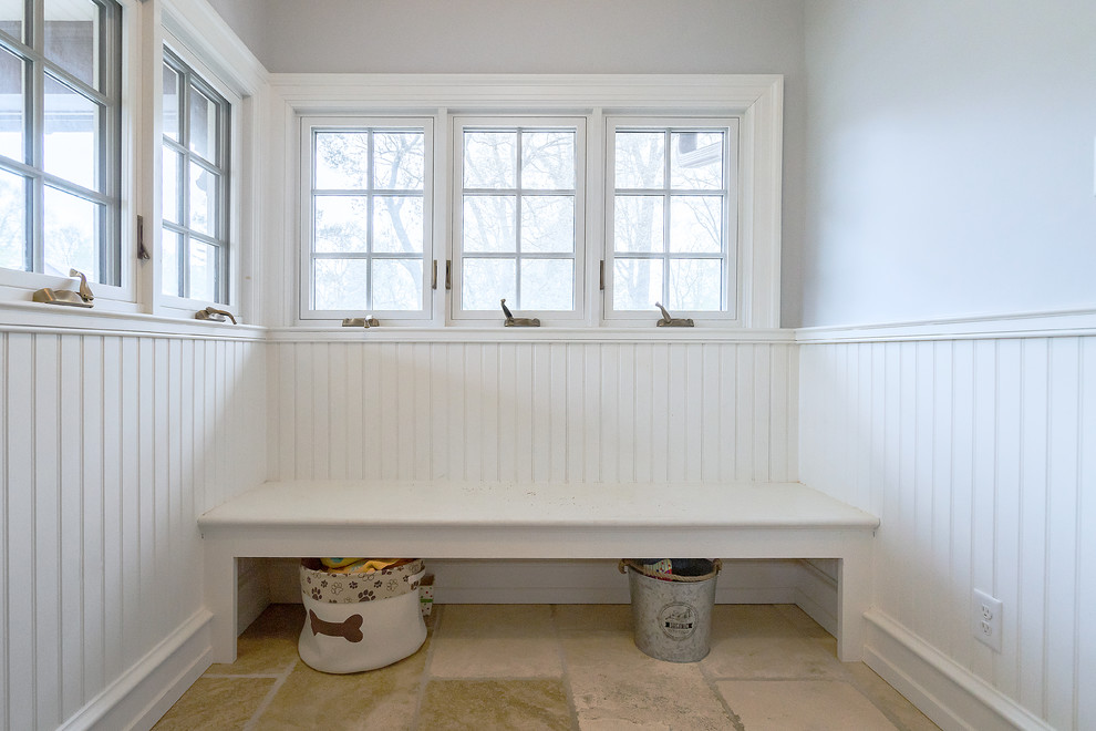 Medium sized classic boot room in Philadelphia with grey walls, limestone flooring, a single front door, a white front door and multi-coloured floors.