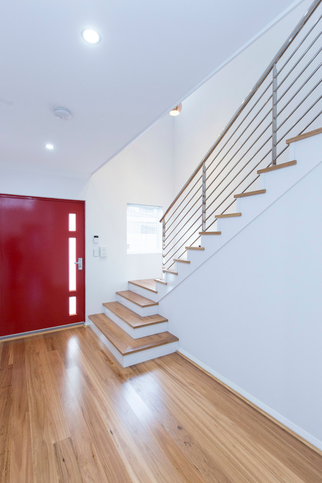 Medium sized contemporary hallway in Perth with white walls, medium hardwood flooring, a pivot front door and a red front door.
