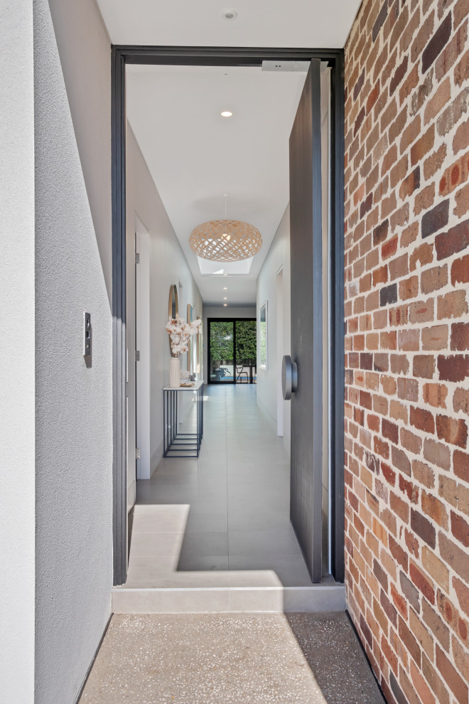 Single front door - contemporary single front door idea in Sydney with a gray front door
