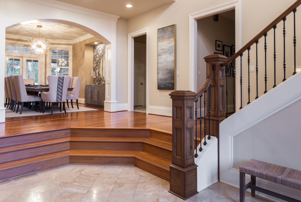 Design ideas for an expansive traditional foyer in Portland with beige walls, porcelain flooring, a single front door and multi-coloured floors.