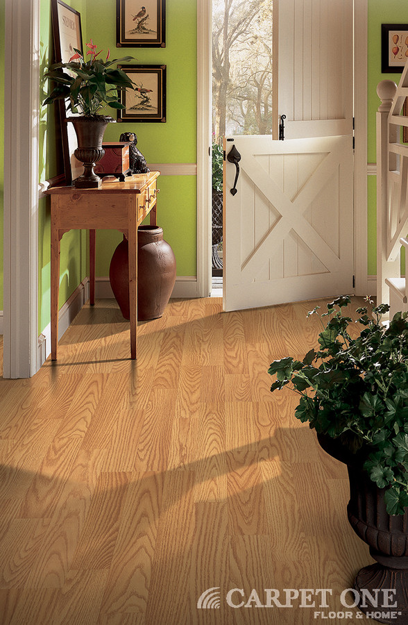 Entryway - small country laminate floor entryway idea in Chicago with green walls and a white front door