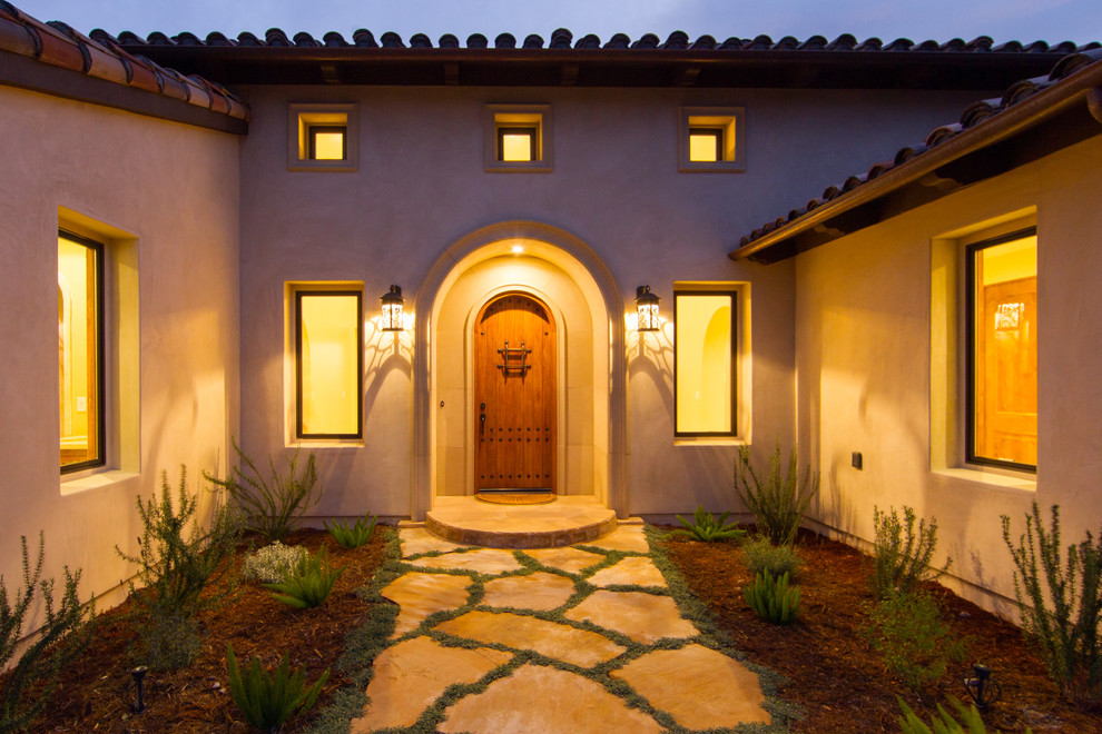 Example of a mid-sized tuscan entryway design in San Luis Obispo